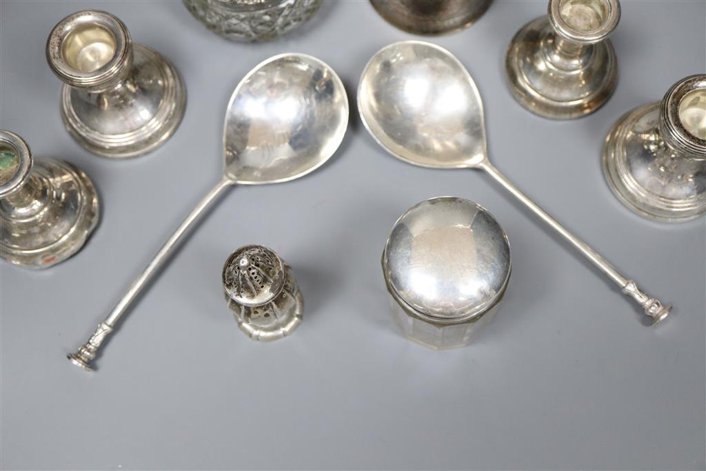 A silver Christening mug, a pair of silver seal top spoons and sundry silver,